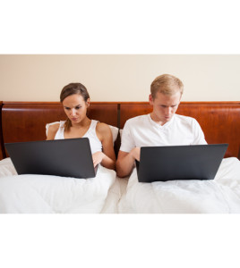 Horizontal view of marriage addicted to internet